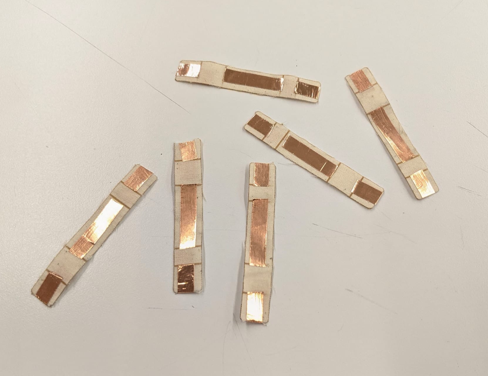 patches taped up with copper tape